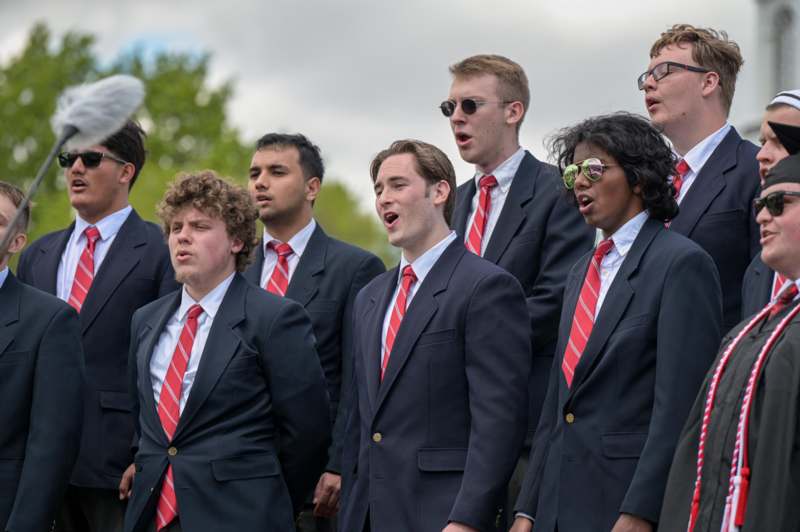 a group of men in suits and ties
