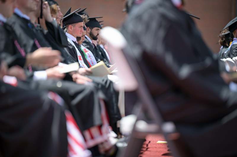a group of people in graduation gowns