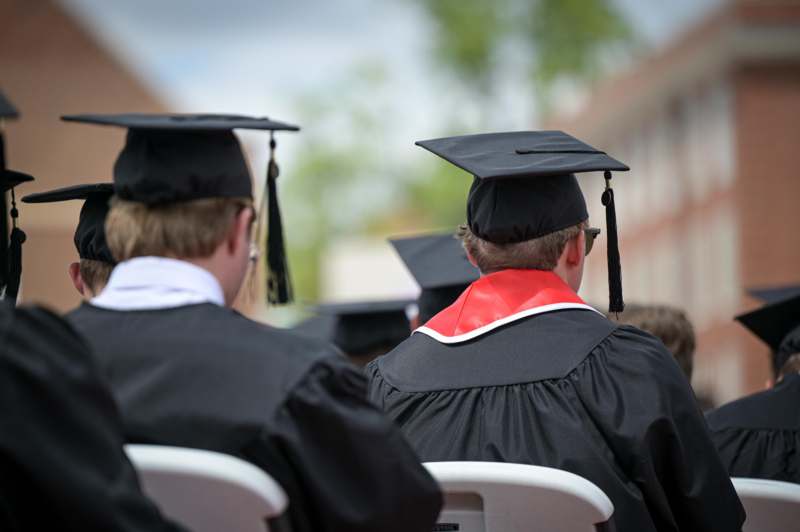 a group of people in graduation gowns