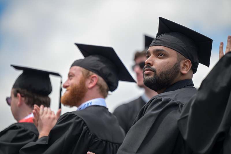 a group of people in graduation gowns