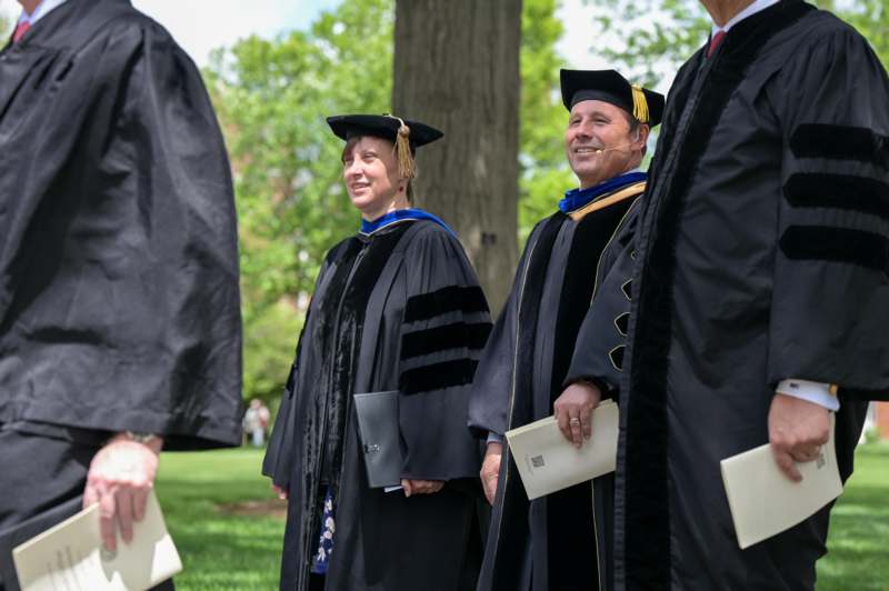 a group of people in graduation gowns
