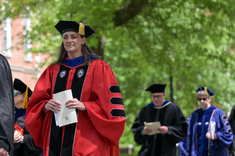 a woman in a graduation gown