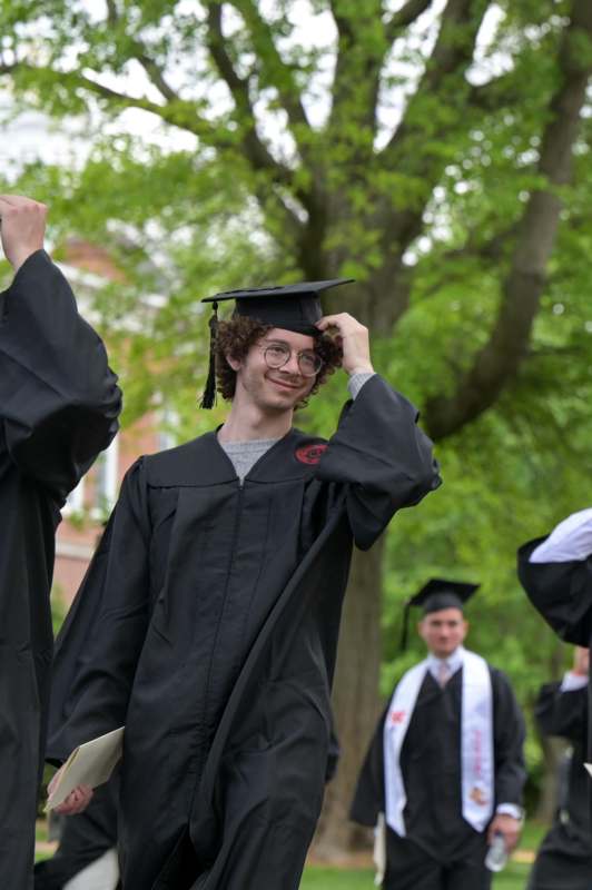 a man in a graduation gown