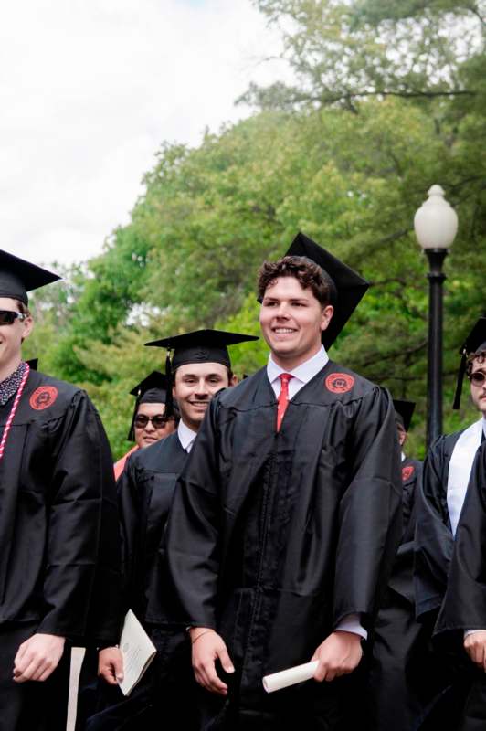a group of people in graduation gowns