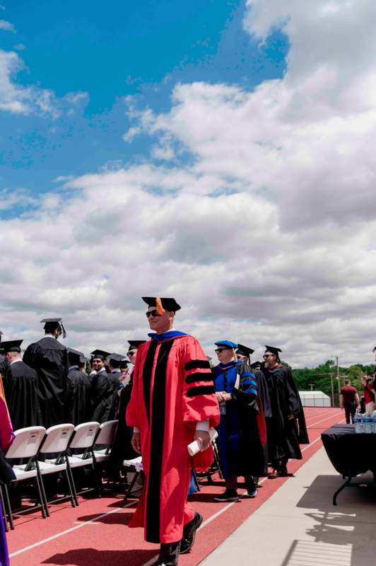 a group of people in graduation gowns