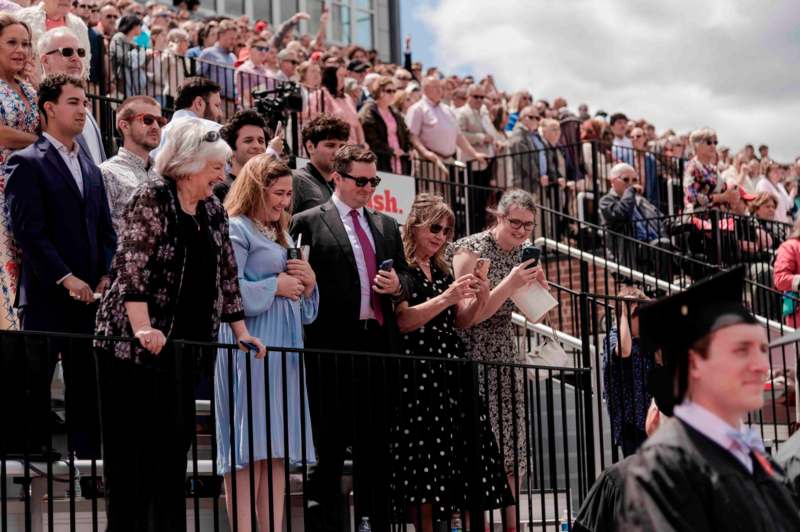 a group of people standing on stairs