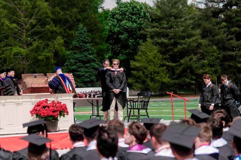 a group of people in graduation gowns