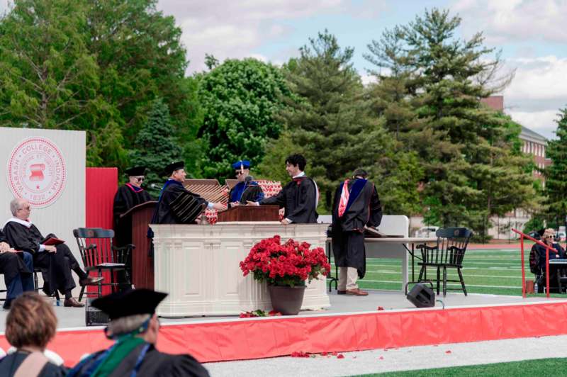 a group of people in graduation gowns