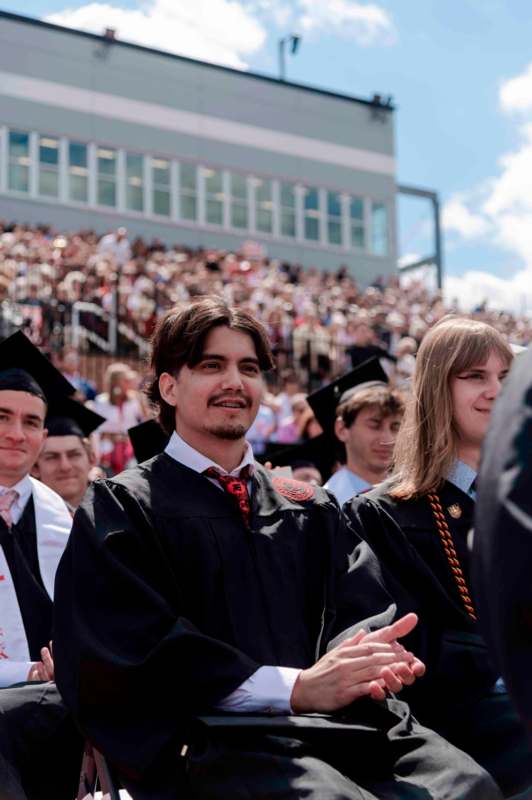 a group of people in graduation gowns