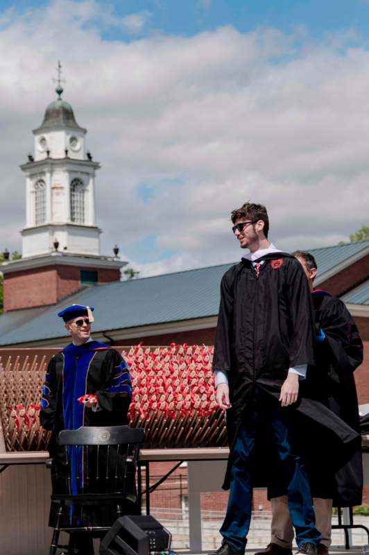 a group of people in graduation gowns