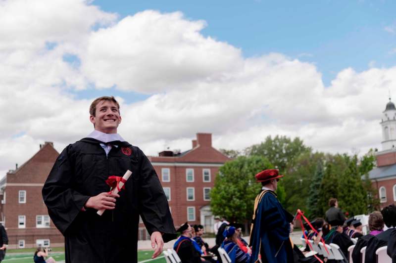 a man in a graduation gown