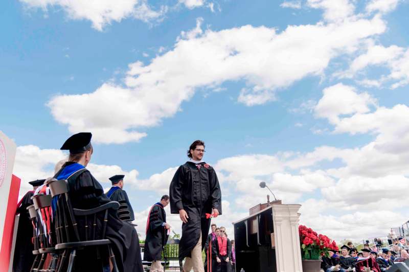 a group of people in graduation gowns