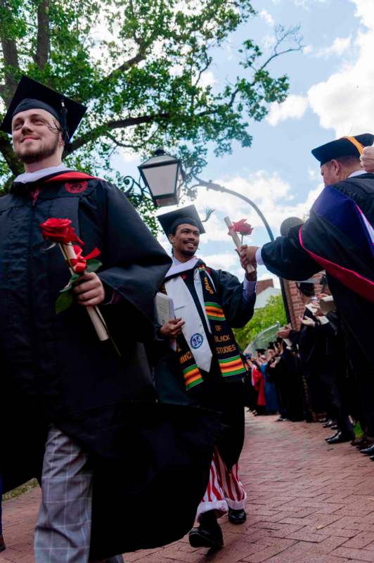 a group of people in graduation gowns