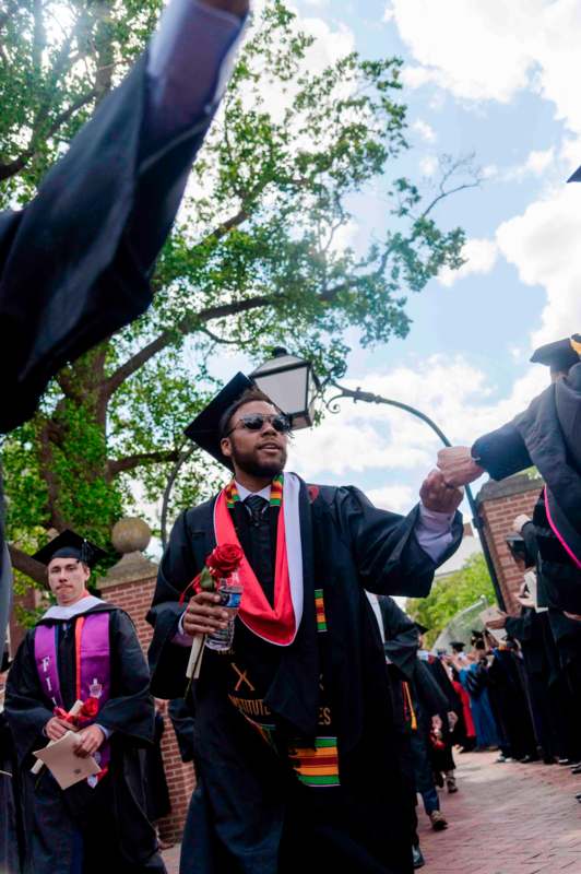 a group of people in graduation gowns