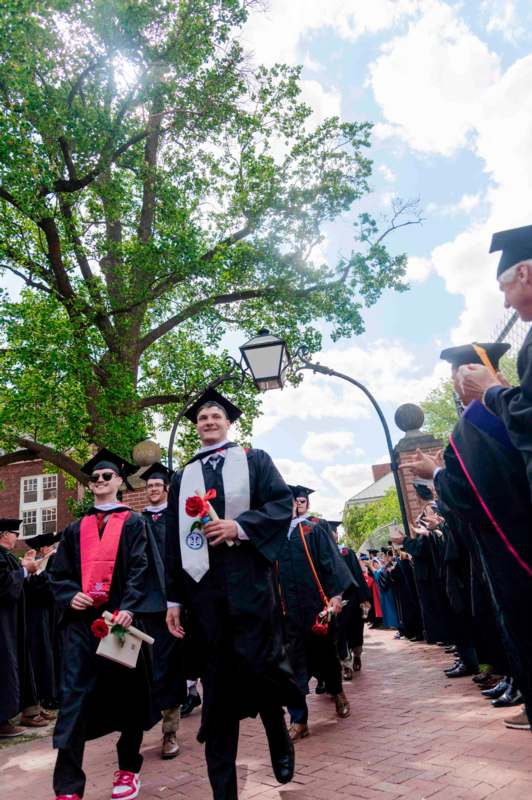 a group of people in graduation gowns