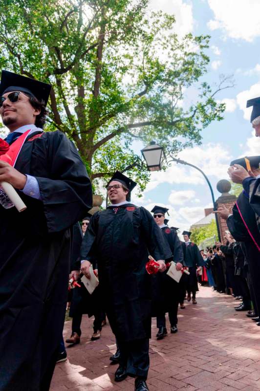 a group of people in graduation gowns