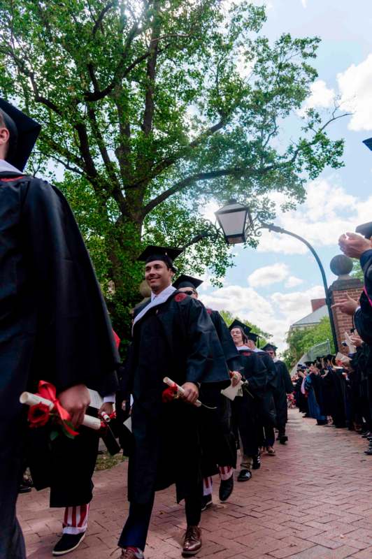 a group of people in graduation gowns
