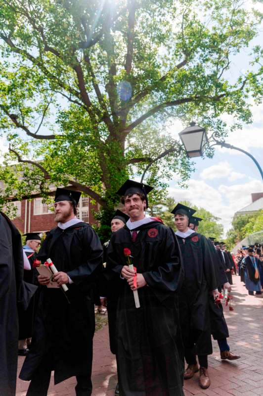 a group of people in graduation gowns