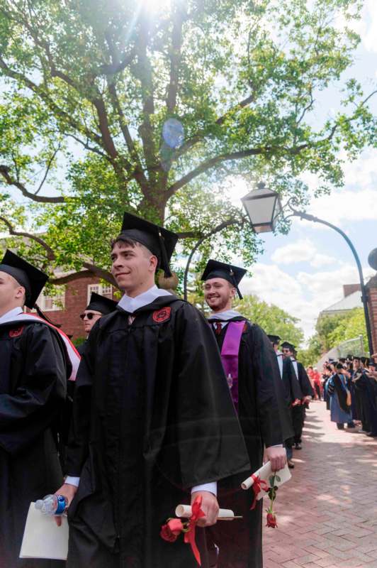 a group of people in graduation gowns