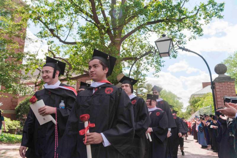 a group of people in graduation gowns