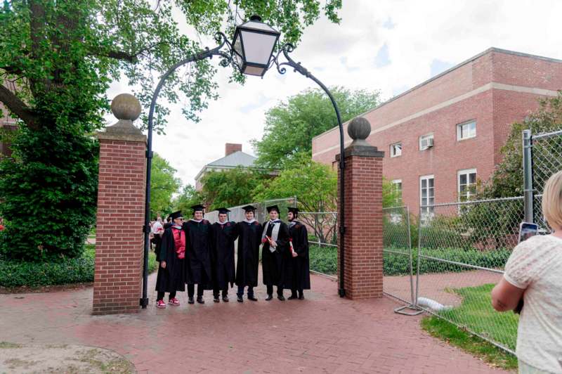 a group of people in graduation gowns