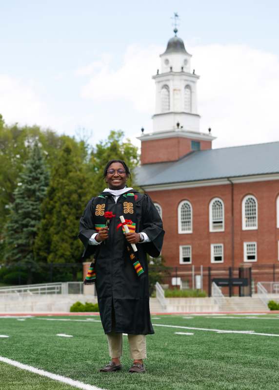 a woman in a graduation gown