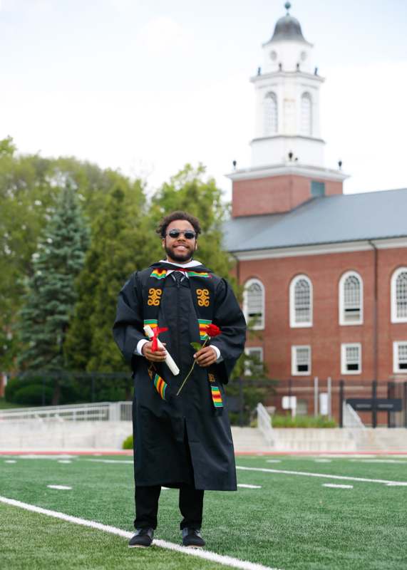 a man in a graduation gown