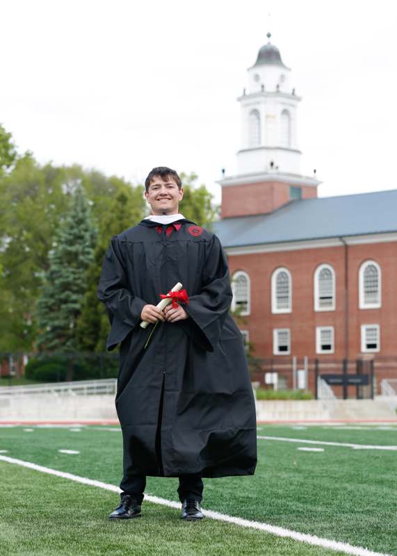 a man in a graduation gown