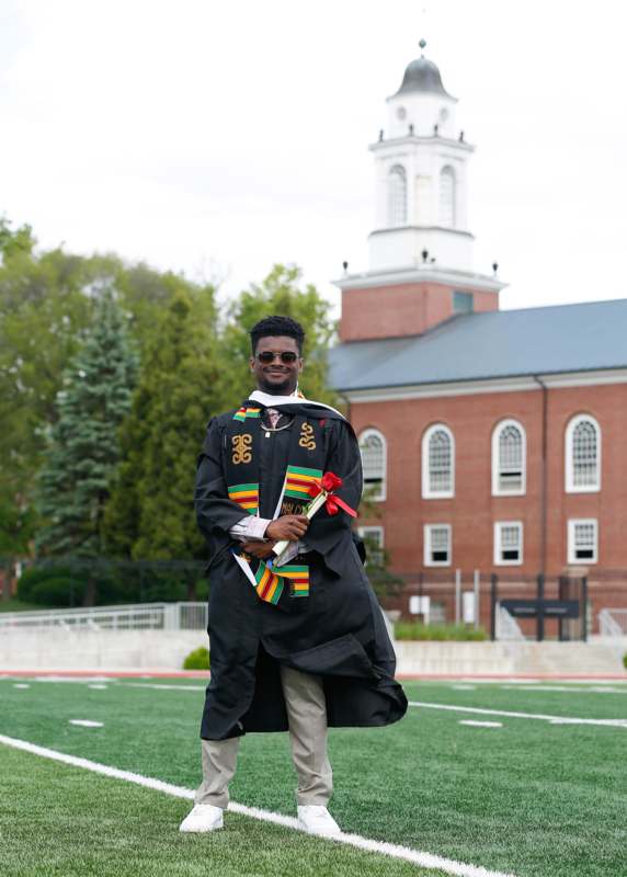 a man in a graduation gown