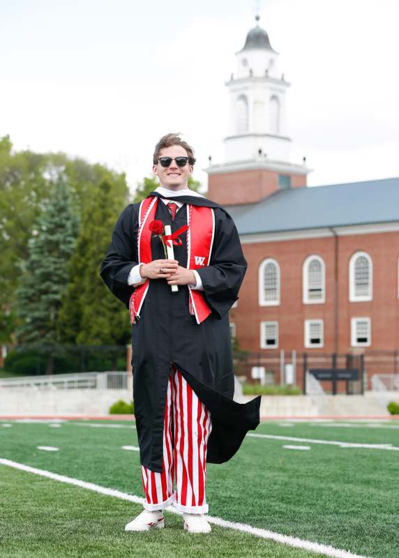 a man in a graduation gown