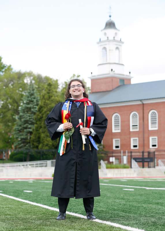 a man in a graduation gown