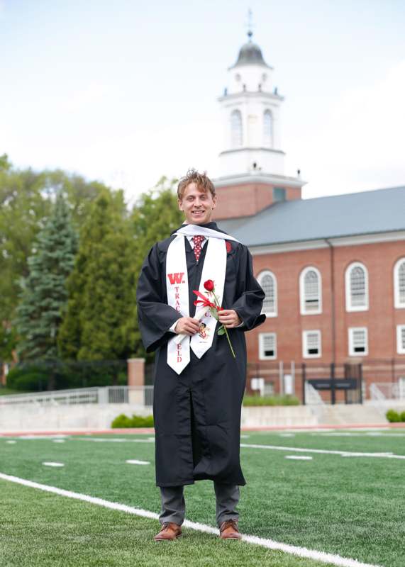 a man in a graduation gown