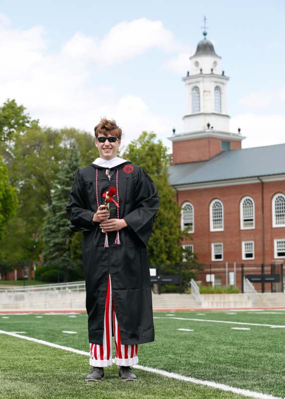 a man in a graduation gown