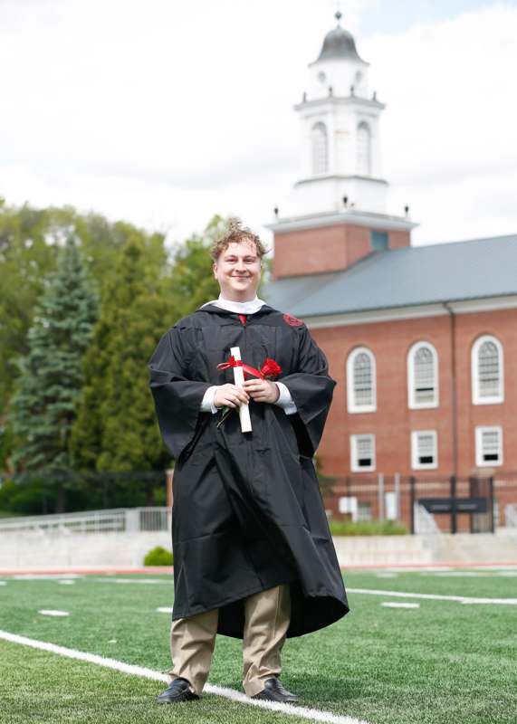 a man in a graduation gown