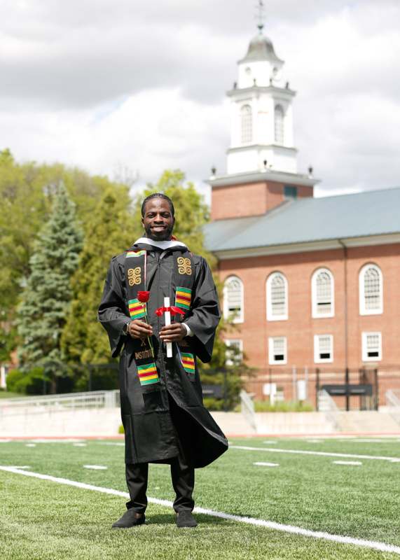 a man in a graduation gown