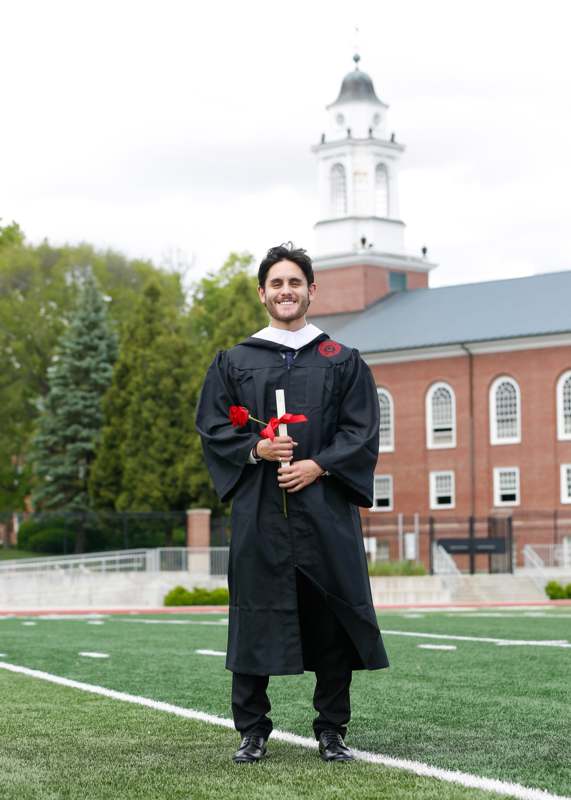 a man in a graduation gown