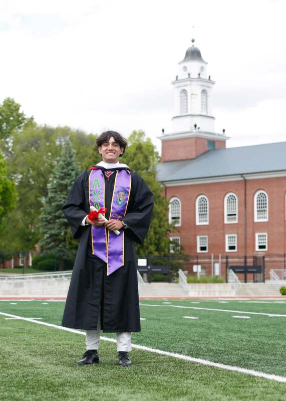 a man in a graduation gown