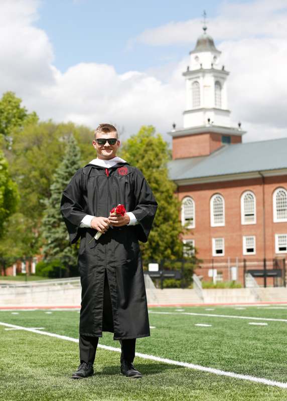 a man in a graduation gown