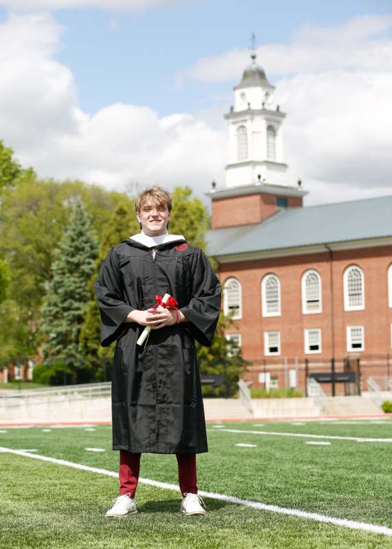 a man in a graduation gown