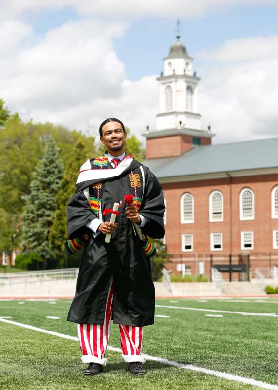 a man in a graduation gown