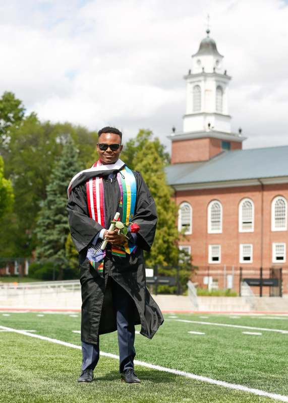 a man in a graduation gown