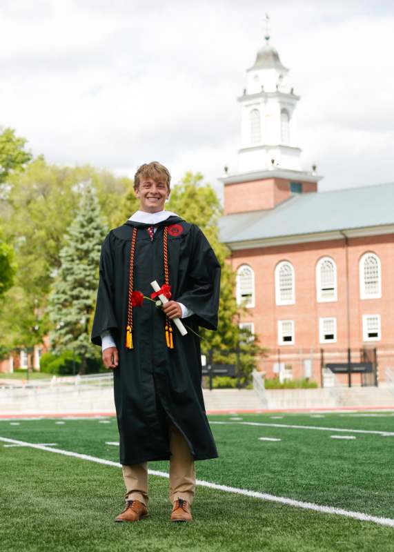 a man in a graduation gown