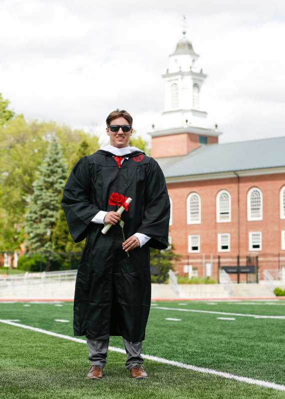 a man in a graduation gown