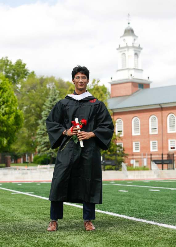 a man in a graduation gown