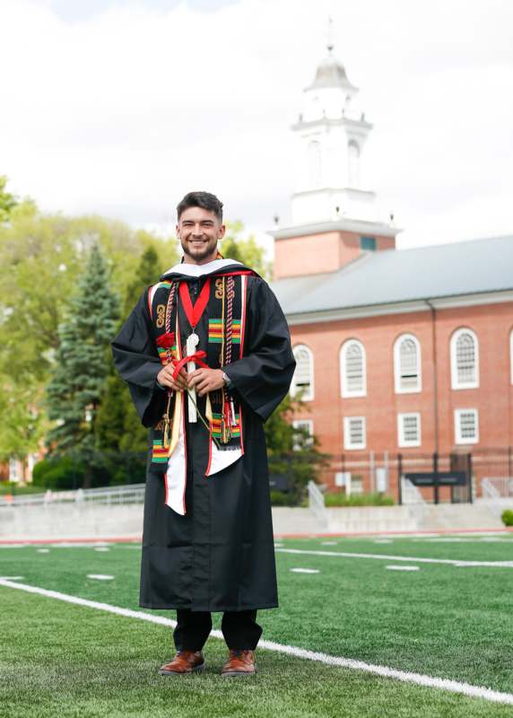 a man in a graduation gown