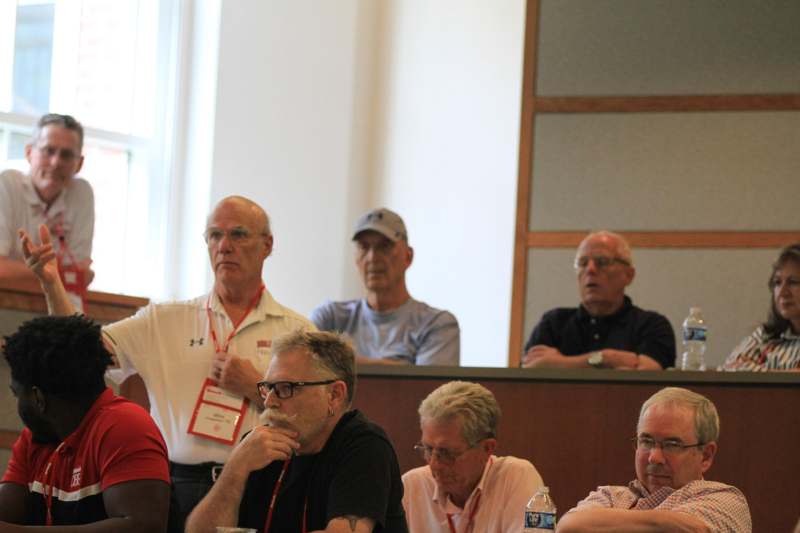 a group of people sitting in a room