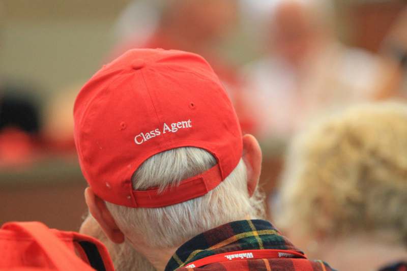 a man wearing a red hat