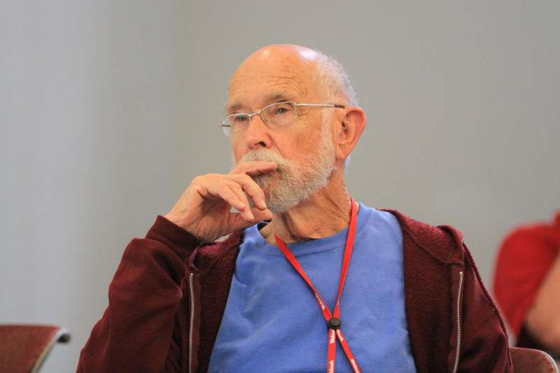 a man with a beard and glasses