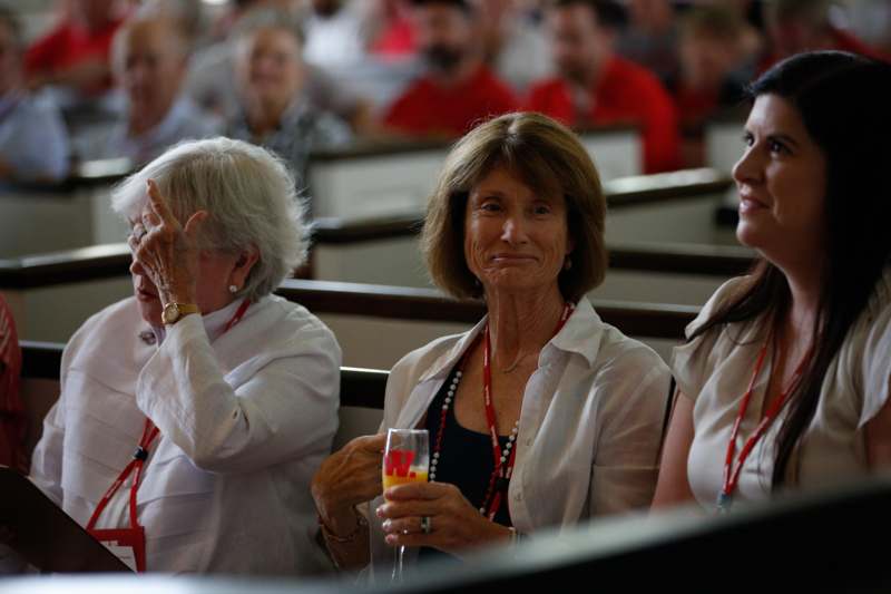 a group of women sitting in pews