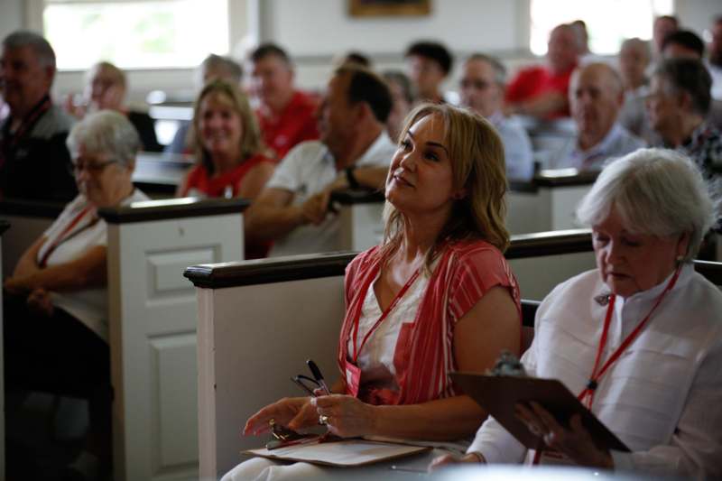 a group of people sitting in a room